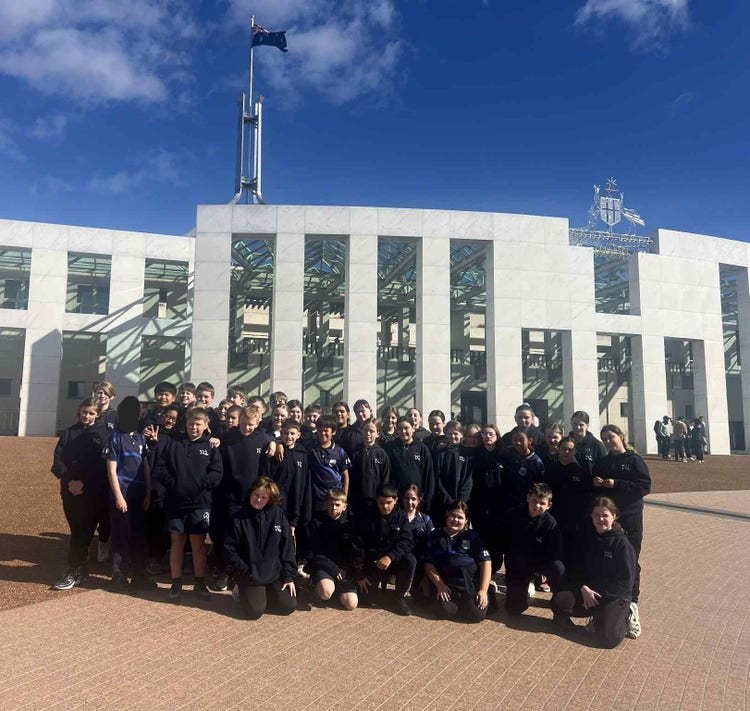 Year 6 students on excursion to Canberra (pictured at Parliament House)